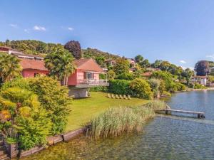 a house on the side of a river at Ranco Villa - 14006 in Ranco