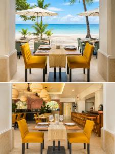 a restaurant with a table and chairs and the beach at Boracay Sands Hotel in Boracay