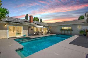 a swimming pool in the backyard of a house at NEW Relax & Explore from MissionViejo | Pool | Spa in Mission Viejo