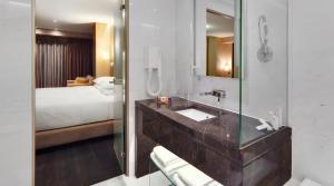 Posteľ alebo postele v izbe v ubytovaní Saz City Life Boutique Hotel