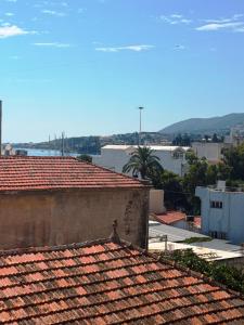 a view of the roofs of buildings in a city at The ViewPoint VP3 in Mytilene