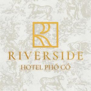 a logo for a hotel with tigers on a wall at Riverside Hotel in Kỳ Vĩ