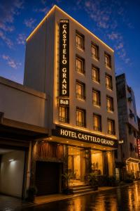 a hotel building with a hotel castilla grande on it at Hotel DSR Krone New Delhi in New Delhi