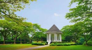 a gazebo in the middle of a park at JH Hotel in Singapore