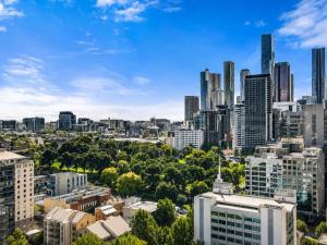 a view of a city skyline with tall buildings at Elevated CBD Retreat - Views & Pool & Sauna! in Melbourne