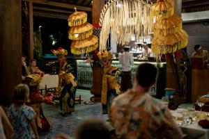 a group of people standing in a room with food at Royal Arkara Villas by Arkamara in Ubud +34 photos