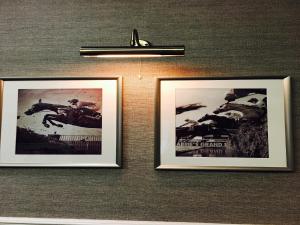 a pair of framed pictures hanging on a wall at The Park Hotel in Liverpool