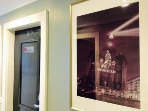 a picture of a picture of a building on a wall at The Park Hotel in Liverpool