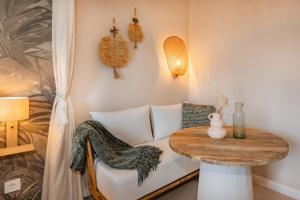 a living room with a table and a couch and a table at BALI BLIZZ - App 15 in Benz