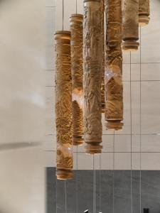 a bunch of objects are hanging in a room at Guangzhou Marriott Hotel Baiyun in Guangzhou +161 photos