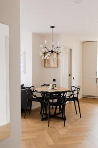 a dining room with a table and chairs at AN apartment 5 in Rēzekne