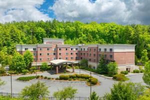an image of a hospital building with trees in the background at Courtyard by Marriott Hanover Lebanon in Lebanon
