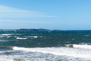 a view of the ocean from the beach at 27m with terrace - first row sea view in Six-Fours-les-Plages