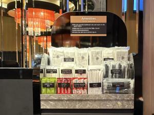 a display case in a store with a bunch of products at APA Hotel Ueno Hirokoji in Tokyo