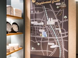 a poster of a map of the metropolitan grid at R Hotel Nagoya Station in Nagoya