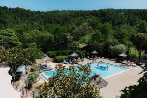 an overhead view of a swimming pool at a resort at Hameau du Prat in Ribes