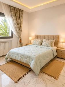 a bedroom with a large bed and a window at Chez Roberto in La Marsa +31 photos
