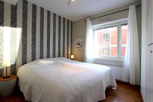 Katil atau katil-katil dalam bilik di Santa Luxury Suite Sauna, WiFi & Parking