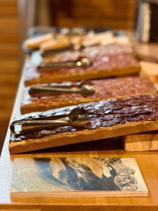 a row of different types of food on a table at Basecamps Cerdanya in Caixáns