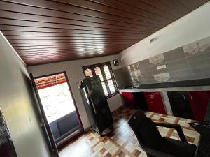 an overhead view of a kitchen with a wooden ceiling at Kds Homestay in Gonikoppal