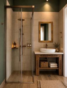 a bathroom with a shower and a sink at Sekeria Hammam & Suites, Historic Mansion Hotel in Heraklio