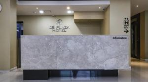 a lobby with a reception desk in a building at cs프라자호텔 in Cheonan
