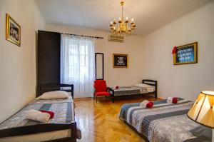 Posteľ alebo postele v izbe v ubytovaní Villa Martinis