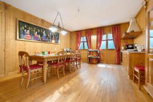 a dining room with a table and chairs at Bnb Casa Fiore in Madice +33 photos