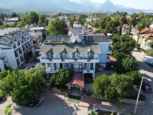 an aerial view of a building in a city at Kutberk Hotel Kemer in Kemer