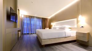 Posteľ alebo postele v izbe v ubytovaní Saz City Life Boutique Hotel