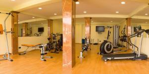 a gym with several exercise equipment in a room at Universal Casa Marquesa in Colònia de Sant Jordi