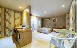 a hotel room with a bed and a bedroom at Hotel Fiona in Seoul