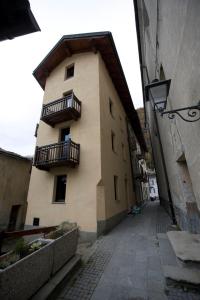 a building with balconies on the side of it at Chalet Motta in Valtournenche