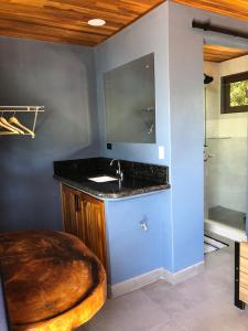a bathroom with a sink and a shower at Club Fred in Punta Mala +18 photos