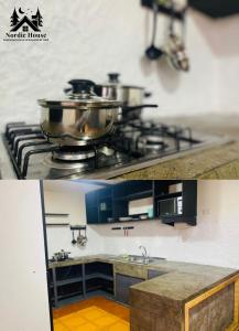 a kitchen with a stove with pots and pans on it at Taltal - Casa Nordic in Taltal +11 photos