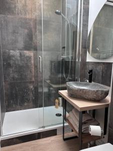 a bathroom with a sink and a shower at Solar Dream - close to Disney in Lagny +24 photos