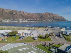 an aerial view of a house and the beach at Palmview Cottage in Cape Town +2 photos