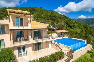 an image of a villa with a swimming pool at Villa Seliora in Sivota