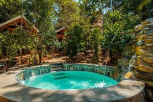 En hage utenfor Manthally Cabanas
