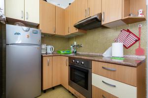 Kuchyňa alebo kuchynka v ubytovaní Apartments Lovorik