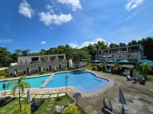 an image of a swimming pool at a resort at Jade Resort - Bauang, La Union in Bauang