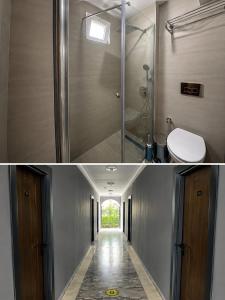 a bathroom with a shower and a toilet in it at Butik İsabel Otel in Kemer +4 photos