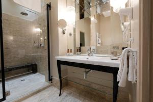 Kúpeľňa v ubytovaní Apart Hotel Torino