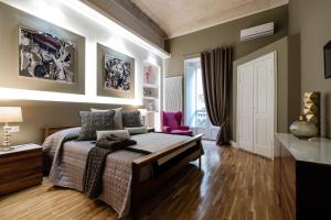 Posteľ alebo postele v izbe v ubytovaní Apart Hotel Torino