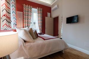 Posteľ alebo postele v izbe v ubytovaní Apart Hotel Torino