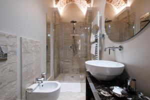 Kúpeľňa v ubytovaní Apart Hotel Torino