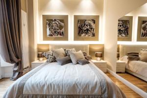 Posteľ alebo postele v izbe v ubytovaní Apart Hotel Torino