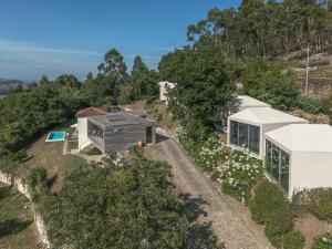 an aerial view of a house on a hill at aMaRe Country House in Caminha