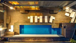 a swimming pool in the middle of a building at Moledo Front Beach by Portugal Active in Viana do Castelo