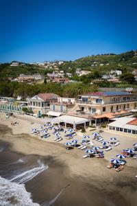 an aerial view of a beach with chairs and umbrellas at Hotel Residence La Darsena in Agropoli